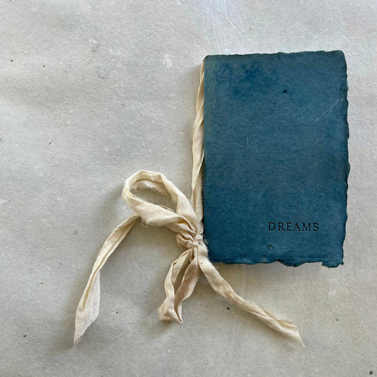 Dreams notebook w indigo paper & soft cloud ribbon