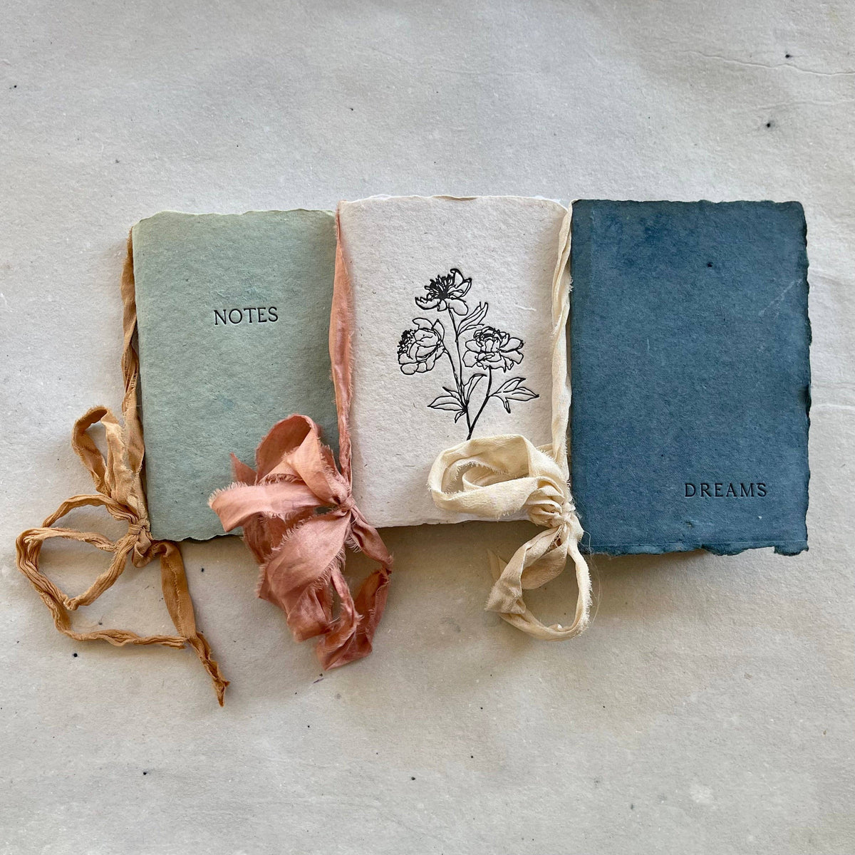 Dreams notebook w indigo paper & soft cloud ribbon
