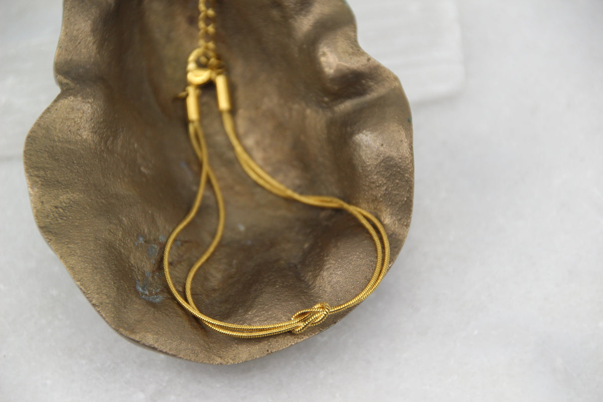 The Eclipse Wore Gold Knot Bracelet