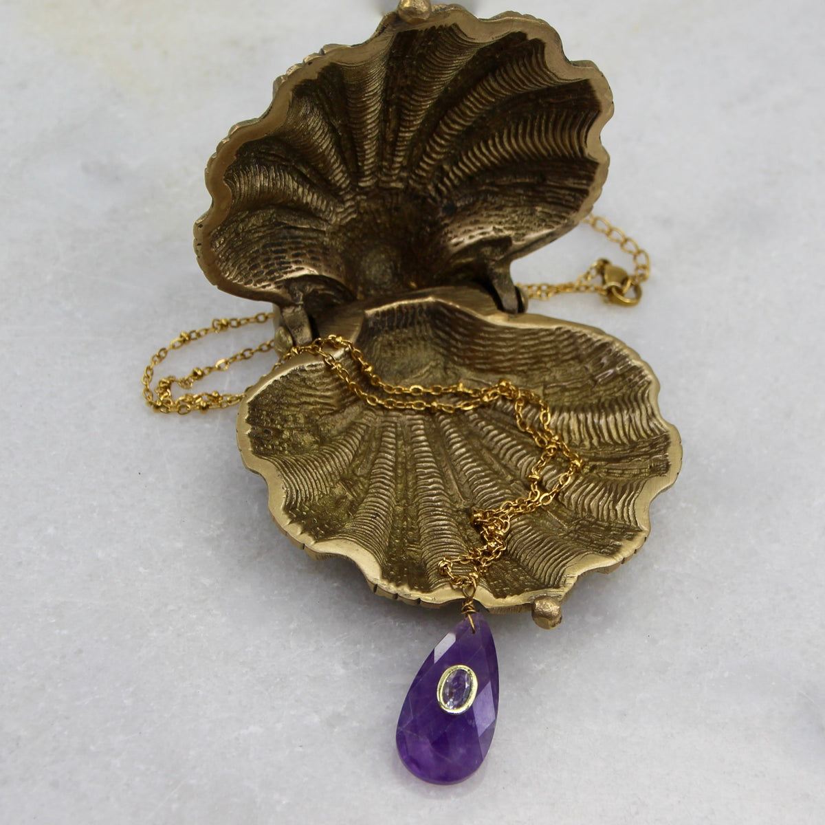 Jupiter's Muse Teared Pendant
