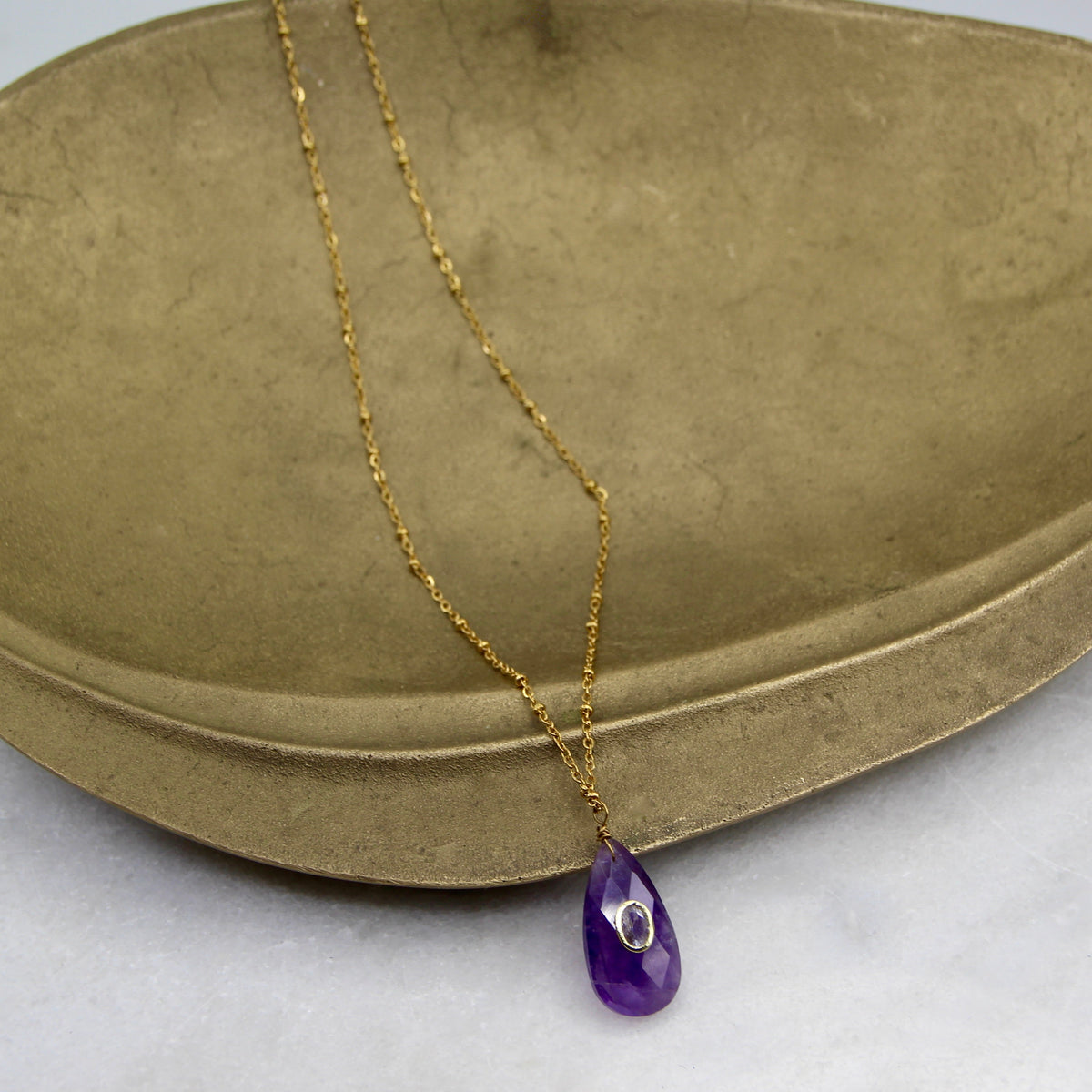 Jupiter's Muse Teared Pendant