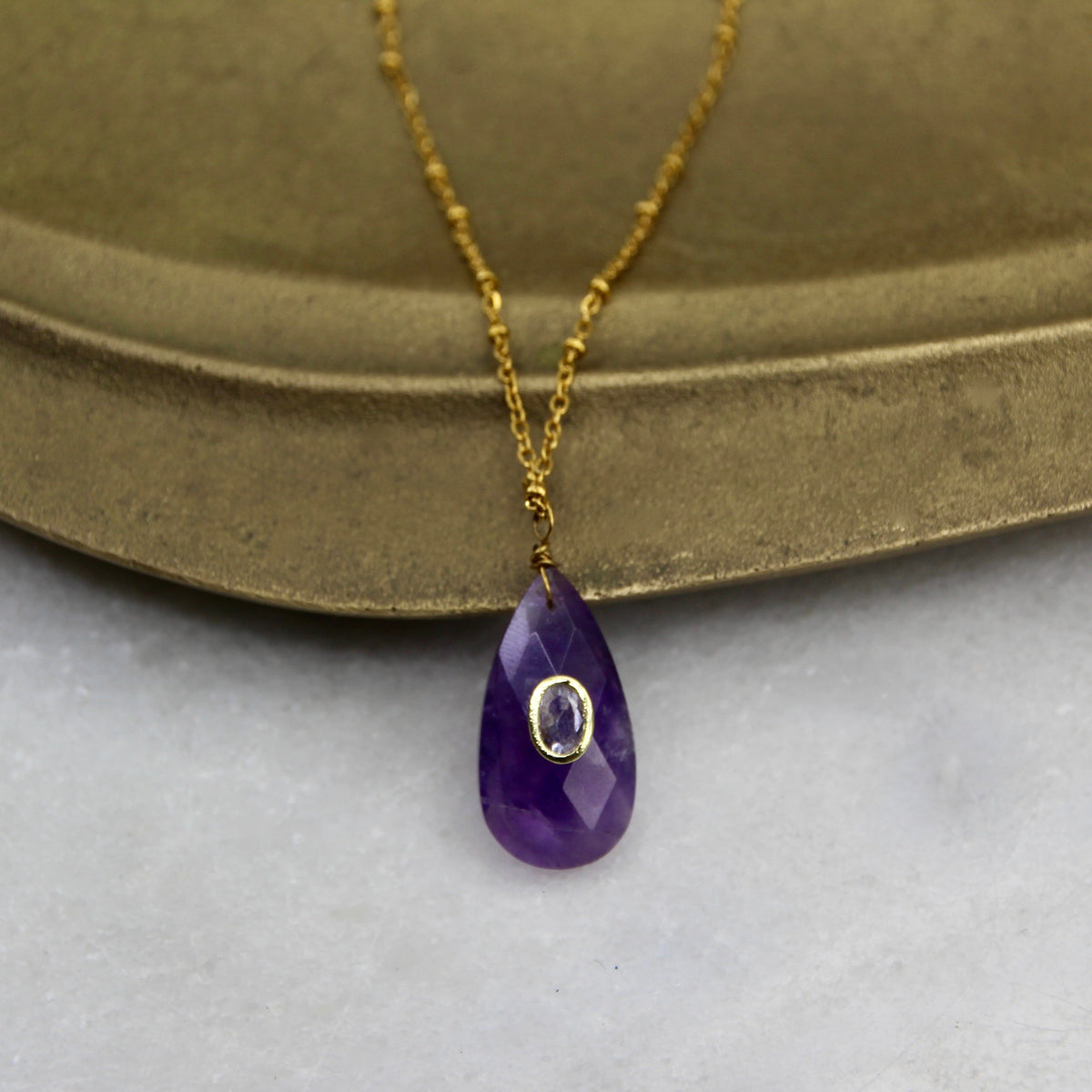 Jupiter's Muse Teared Pendant